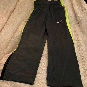 NIKE Long pants for big boys smal size. Used but in good condition.